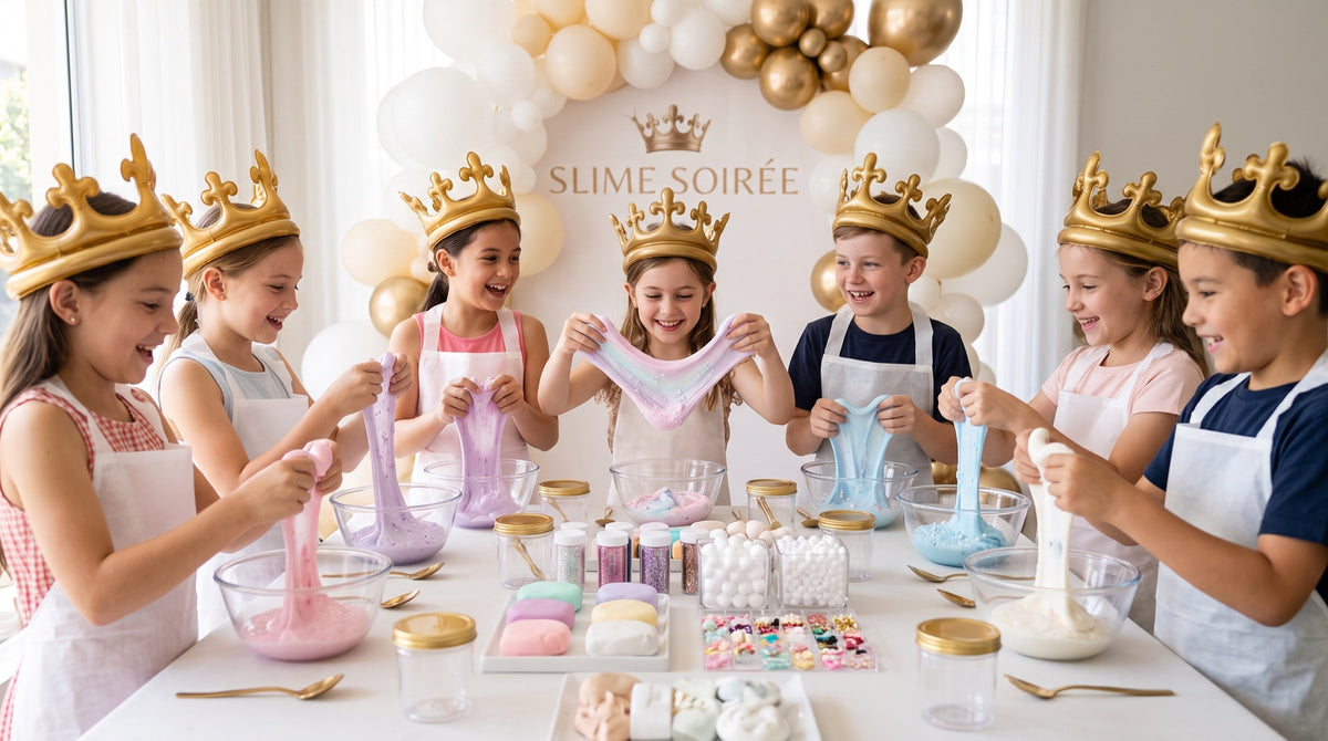 Seven children in gold crowns stretching pastel slime at a white party table in front of a Slime Soiree balloon backdrop